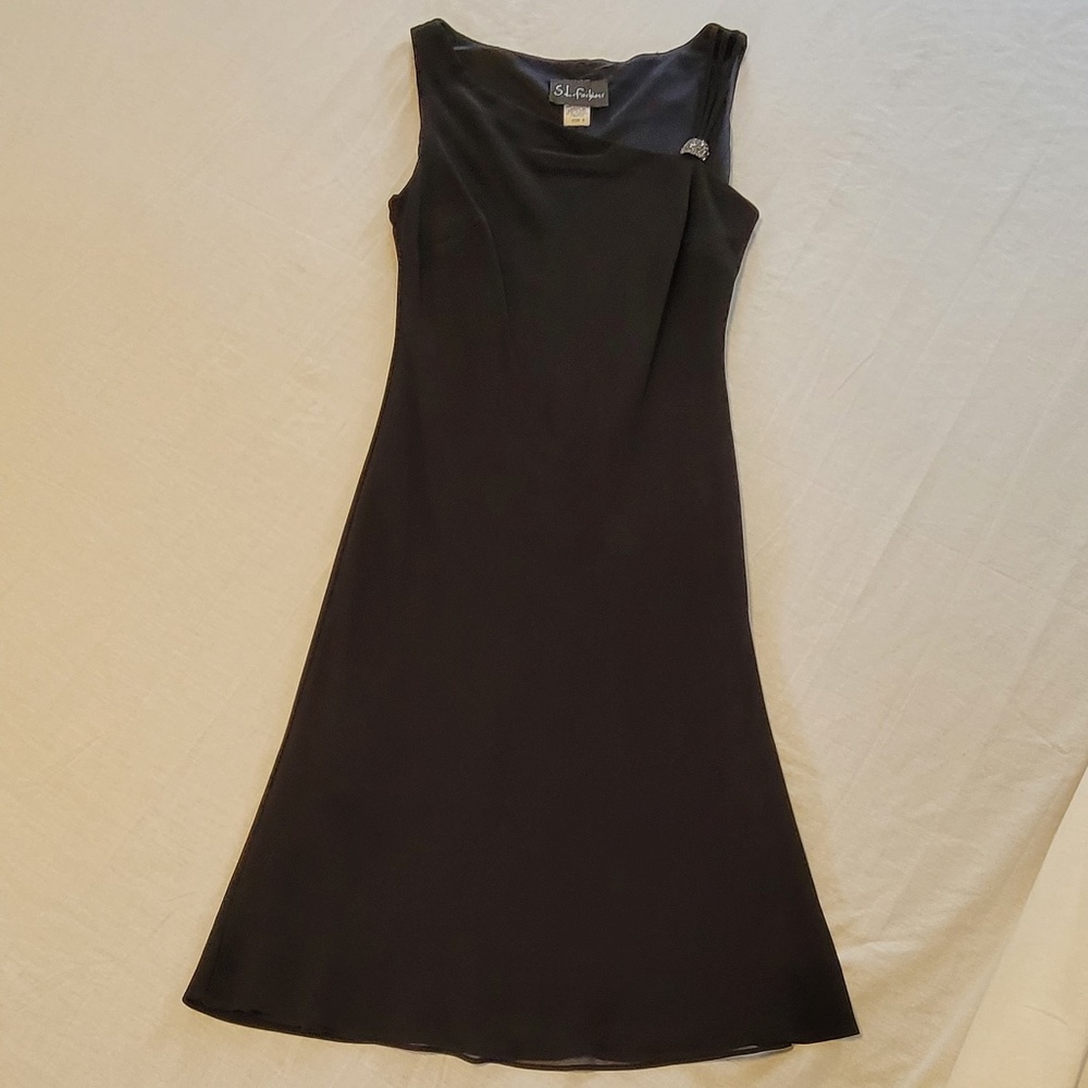 Black dress with Rhinestone Brooch